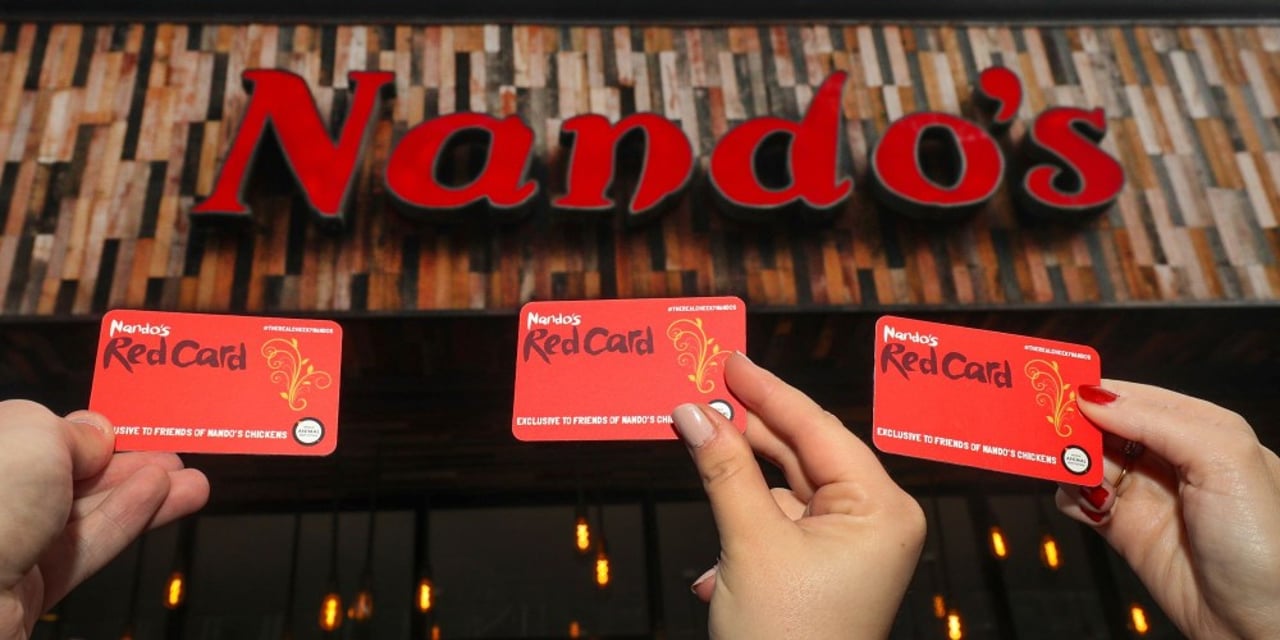 therealcheekynandos._commuters_show_nandos_their_red_cards_by_world_animal_procection__0