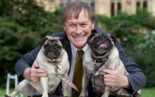 David Amess with dogs Lilly and Bo at the Westminster Dog of the Year in Victoria Tower Park in 2013 CREDIT: Heathcliff O'Malley