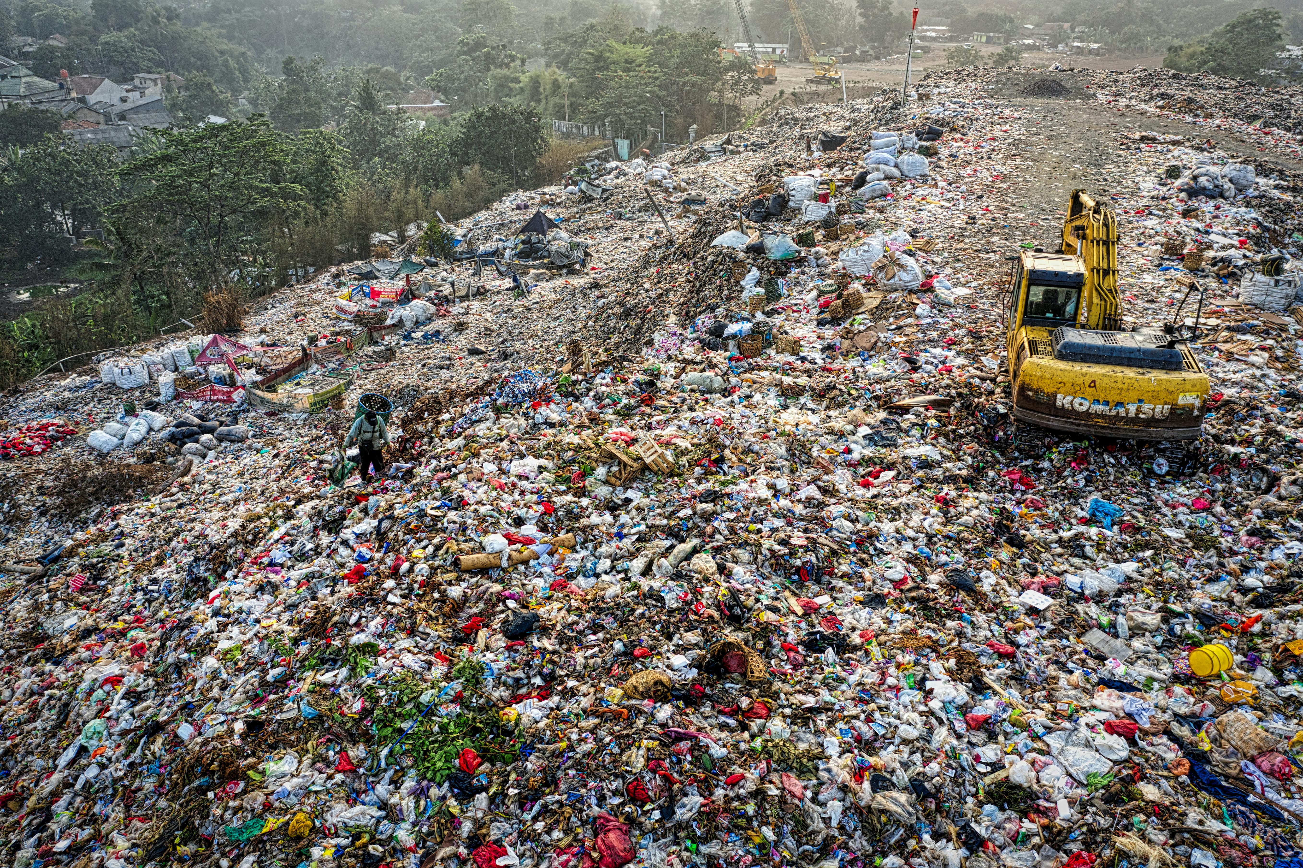 An aerial photograph of a landfill full of plastic